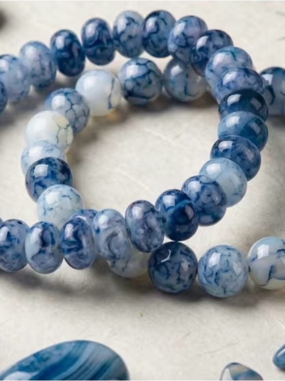 ONE Handmade Bohemian Blue &
White Beaded Elastic Anxiety bracelet NWOT